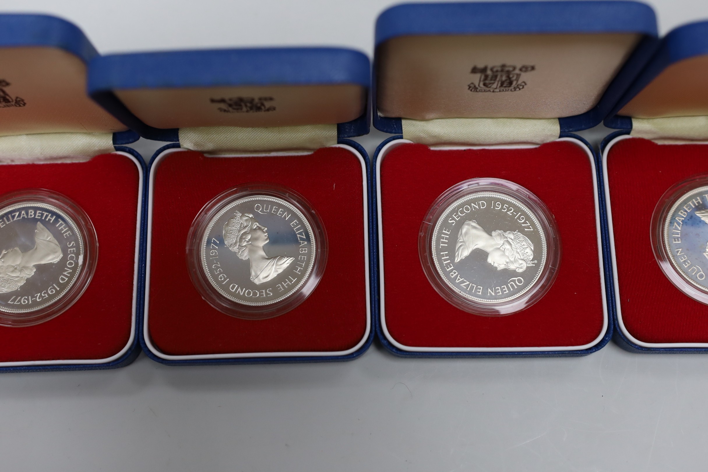 Eight Royal Mint QEII Commonwealth proof silver commemorative coins